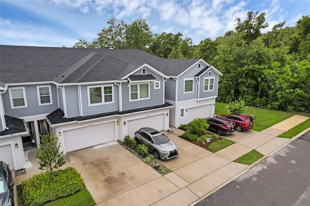 1932 Terrapin Rd, Ocoee, FL 34761 - view of front of home featuring an attached garage, concrete driveway, and a shingled roof