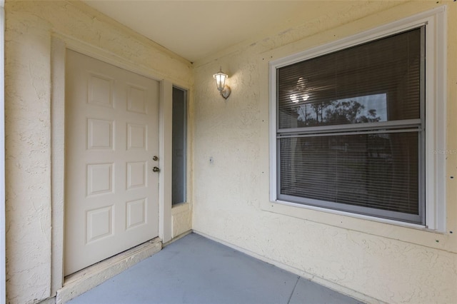 309 Kirkcaldy Dr, Winter Springs, FL 32708 - view of exterior entry with stucco siding