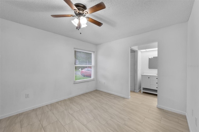 309 Kirkcaldy Dr, Winter Springs, FL 32708 - empty room with a textured ceiling, ceiling fan, and baseboards