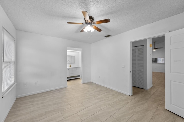 309 Kirkcaldy Dr, Winter Springs, FL 32708 - unfurnished room with a ceiling fan, a textured ceiling, and baseboards