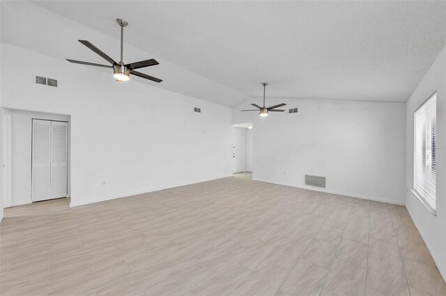 309 Kirkcaldy Dr, Winter Springs, FL 32708 - unfurnished living room with a ceiling fan and vaulted ceiling