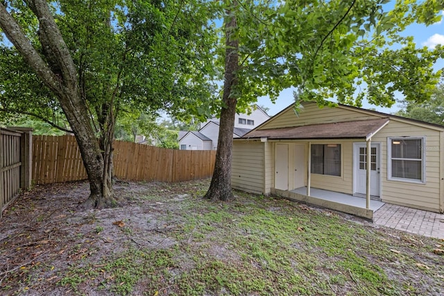 309 Kirkcaldy Dr, Winter Springs, FL 32708 - fenced backyard featuring a patio