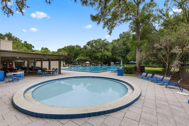 309 Kirkcaldy Dr, Winter Springs, FL 32708 - community pool with a patio area