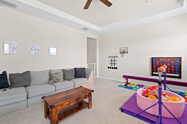 7163 Talamore Dr, Wesley Chapel, FL 33545 - living area featuring ceiling fan, carpet, and baseboards