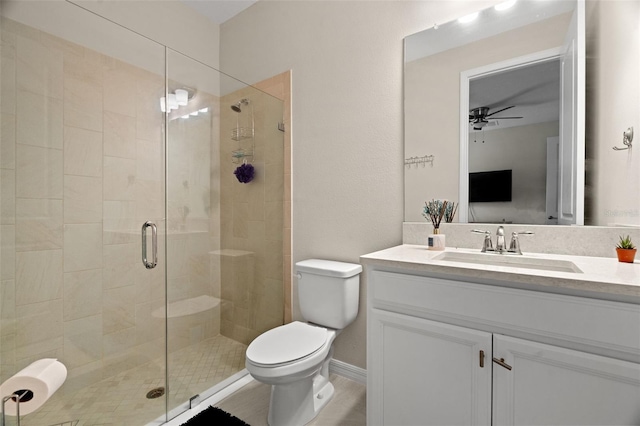 7163 Talamore Dr, Wesley Chapel, FL 33545 - full bathroom with a ceiling fan, vanity, a shower stall, and toilet
