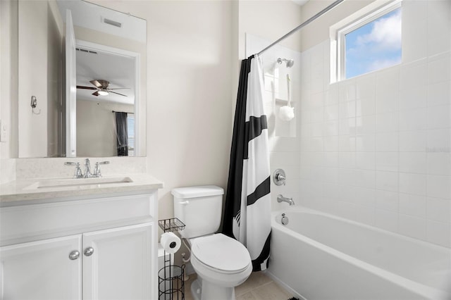 7163 Talamore Dr, Wesley Chapel, FL 33545 - bathroom featuring toilet, shower / bath combination with curtain, vanity, a ceiling fan, and tile patterned floors