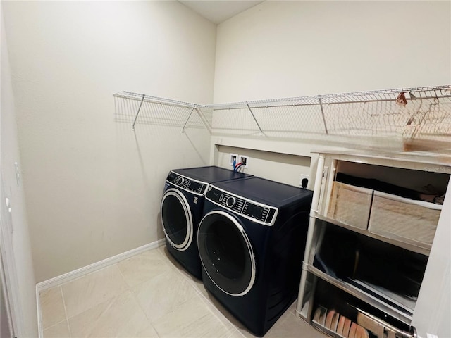 7163 Talamore Dr, Wesley Chapel, FL 33545 - laundry room featuring washer and dryer and baseboards