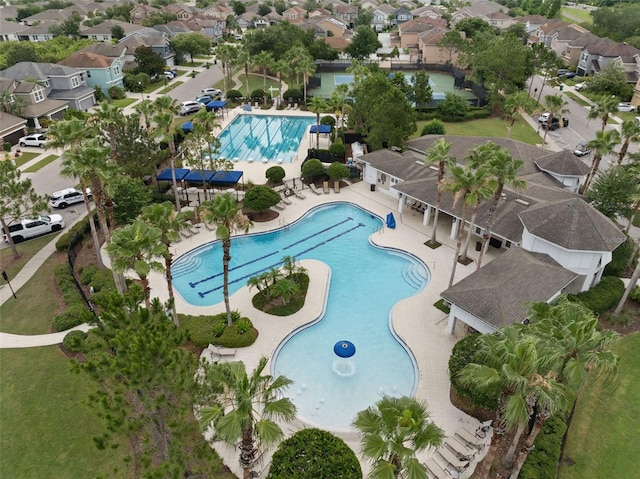 7163 Talamore Dr, Wesley Chapel, FL 33545 - community pool with a residential view and a patio