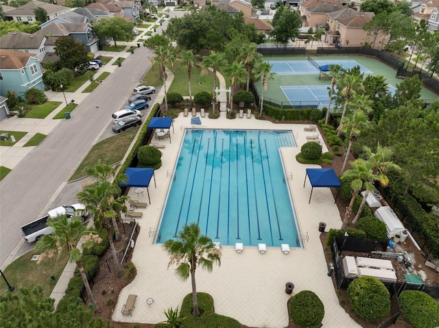 7163 Talamore Dr, Wesley Chapel, FL 33545 - community pool featuring a residential view and a patio