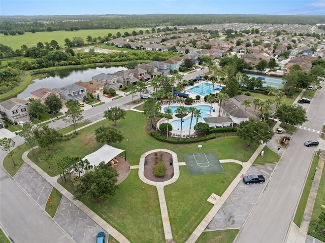 7163 Talamore Dr, Wesley Chapel, FL 33545 - aerial view of residential area with a pool area and a nearby body of water