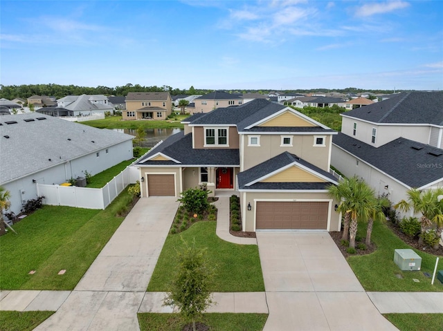 7163 Talamore Dr, Wesley Chapel, FL 33545 - traditional home featuring a residential view, driveway, a shingled roof, and stucco siding