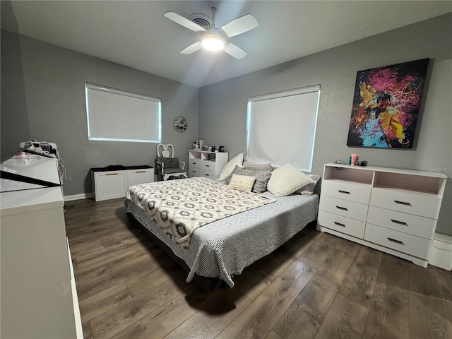 3702 Mirror Lake Dr, Apopka, FL 32703 - bedroom with dark wood-style flooring and ceiling fan