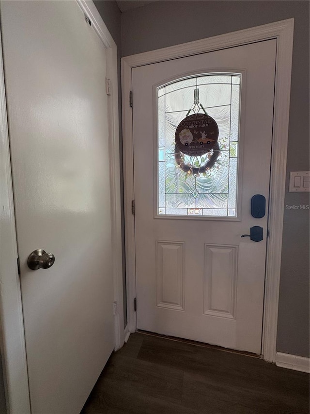 3702 Mirror Lake Dr, Apopka, FL 32703 - doorway with dark wood finished floors