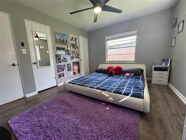 3702 Mirror Lake Dr, Apopka, FL 32703 - bedroom featuring wood finished floors, baseboards, and ceiling fan