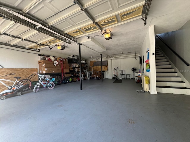3702 Mirror Lake Dr, Apopka, FL 32703 - garage featuring a garage door opener
