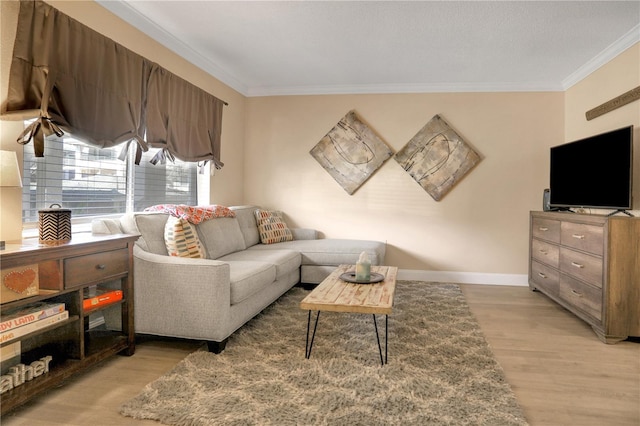 145 Oyster Bay Cir Unit 140, Altamonte Springs, FL 32701 - living area with crown molding, light wood-style flooring, and baseboards