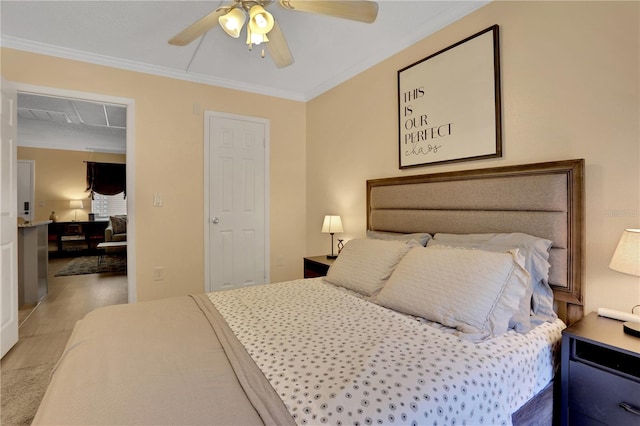 145 Oyster Bay Cir Unit 140, Altamonte Springs, FL 32701 - bedroom featuring ornamental molding and ceiling fan
