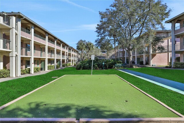 145 Oyster Bay Cir Unit 140, Altamonte Springs, FL 32701 - surrounding community with a putting green and a lawn