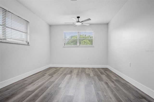 418 Tulane Dr, Altamonte Springs, FL 32714 - unfurnished room featuring a ceiling fan, wood finished floors, and baseboards