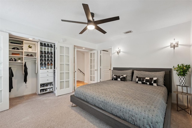 602 E Livingston St Unit 3, Orlando, FL 32803 - carpeted bedroom with baseboards, a closet, french doors, and a ceiling fan