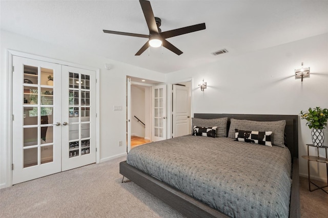 602 E Livingston St Unit 3, Orlando, FL 32803 - carpeted bedroom featuring french doors, baseboards, and ceiling fan