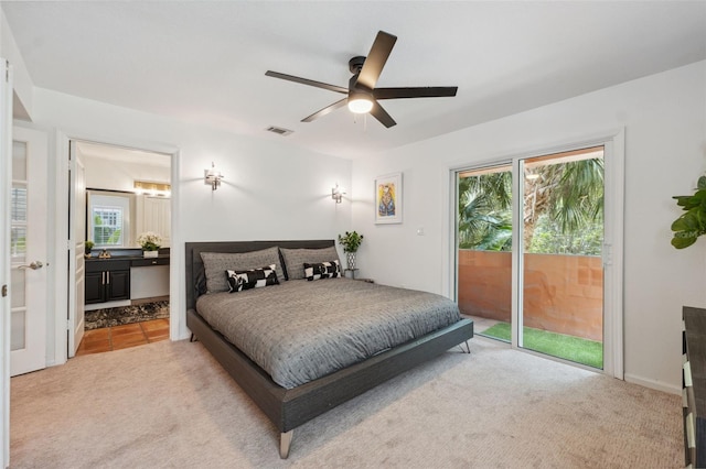 602 E Livingston St Unit 3, Orlando, FL 32803 - bedroom with access to outside, multiple windows, light carpet, and ensuite bathroom