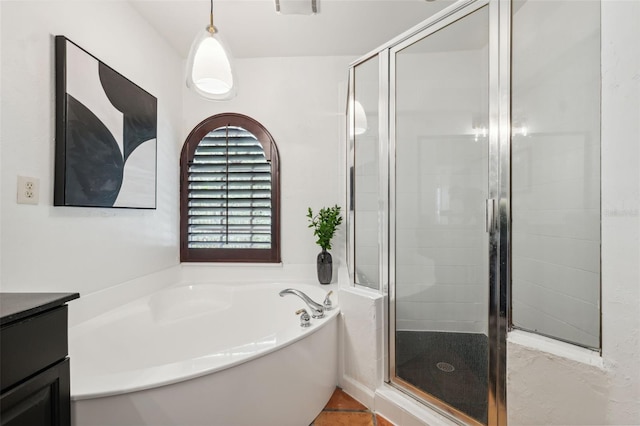 602 E Livingston St Unit 3, Orlando, FL 32803 - full bath featuring a garden tub, a shower stall, and vanity