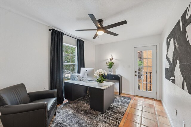602 E Livingston St Unit 3, Orlando, FL 32803 - office featuring a ceiling fan, light tile patterned floors, and baseboards