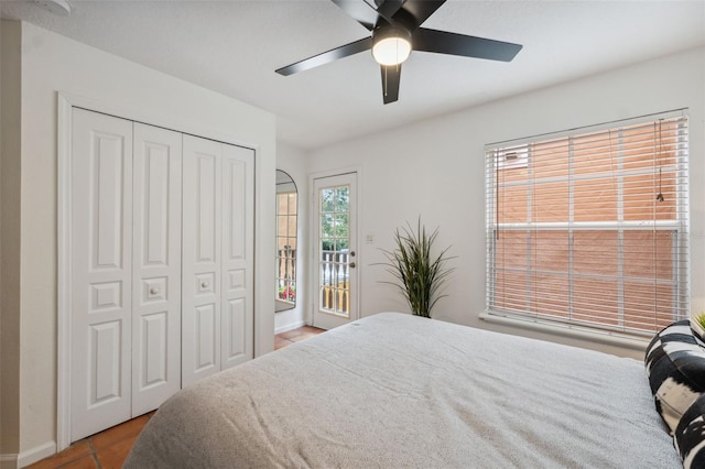 602 E Livingston St Unit 3, Orlando, FL 32803 - bedroom with access to outside, tile patterned flooring, a closet, a ceiling fan, and baseboards