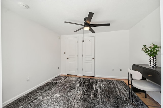 602 E Livingston St Unit 3, Orlando, FL 32803 - unfurnished office with ceiling fan, baseboards, and wood finished floors