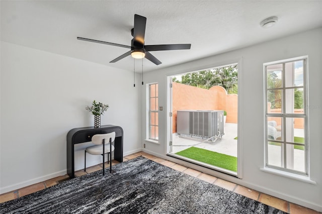 602 E Livingston St Unit 3, Orlando, FL 32803 - unfurnished room with ceiling fan, tile patterned floors, and baseboards