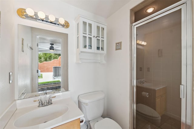 602 E Livingston St Unit 3, Orlando, FL 32803 - full bath featuring toilet, vanity, a stall shower, and ceiling fan
