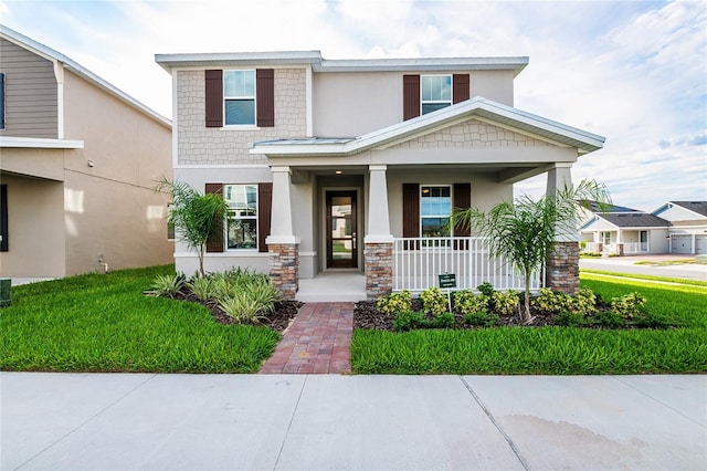 9106 Cut Shot Dr, Winter Garden, FL 34787 - view of front of house with covered porch and stucco siding