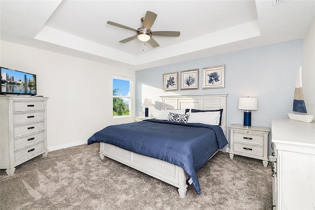 9106 Cut Shot Dr, Winter Garden, FL 34787 - bedroom featuring a raised ceiling, carpet, baseboards, and ceiling fan