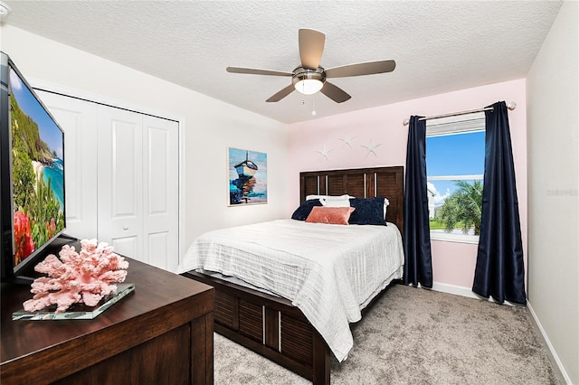 9106 Cut Shot Dr, Winter Garden, FL 34787 - bedroom with a closet, light colored carpet, baseboards, and a ceiling fan