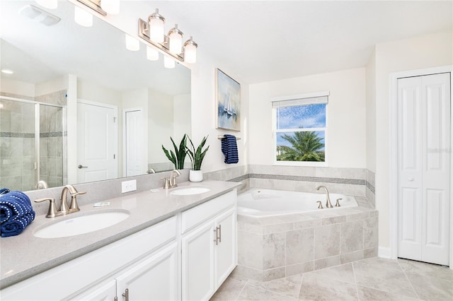 9106 Cut Shot Dr, Winter Garden, FL 34787 - bathroom featuring a shower stall, double vanity, a closet, a bath, and tile patterned flooring