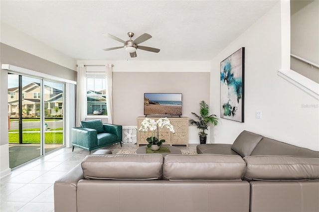 9106 Cut Shot Dr, Winter Garden, FL 34787 - living room featuring a ceiling fan and tile patterned floors