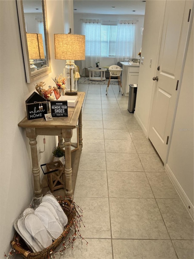 746 Longboat Dr, Davenport, FL 33896 - hall featuring light tile patterned floors