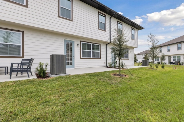 746 Longboat Dr, Davenport, FL 33896 - back of property featuring a patio and a yard