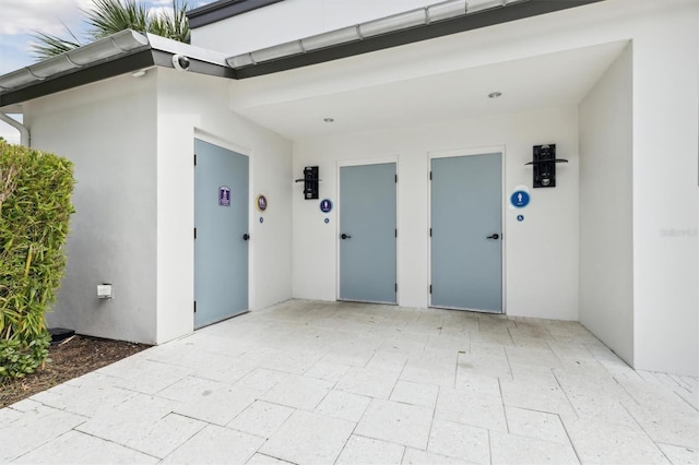 746 Longboat Dr, Davenport, FL 33896 - entrance to property featuring stucco siding