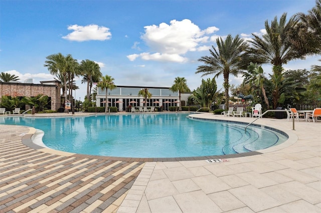 746 Longboat Dr, Davenport, FL 33896 - community pool featuring a patio area