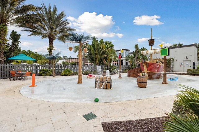 746 Longboat Dr, Davenport, FL 33896 - view of home's community with a patio area