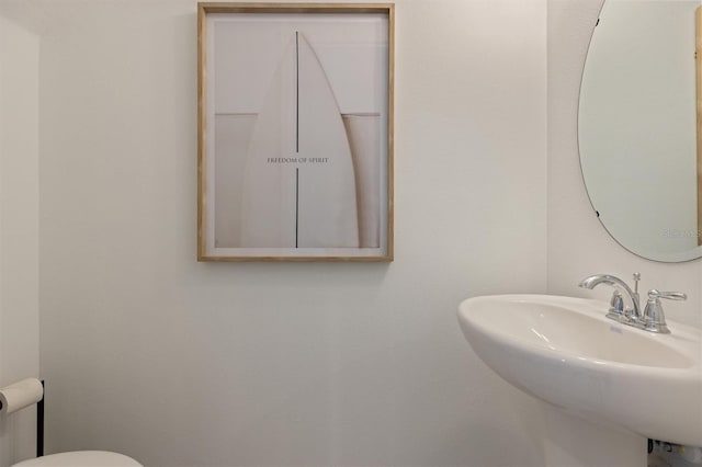 746 Longboat Dr, Davenport, FL 33896 - bathroom with a sink and toilet