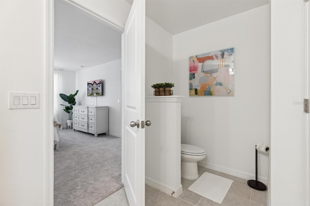 746 Longboat Dr, Davenport, FL 33896 - bathroom featuring toilet and baseboards