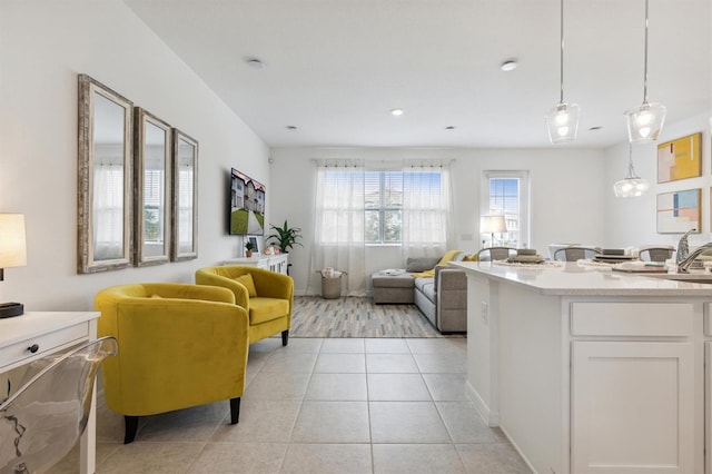 746 Longboat Dr, Davenport, FL 33896 - living area featuring light tile patterned floors