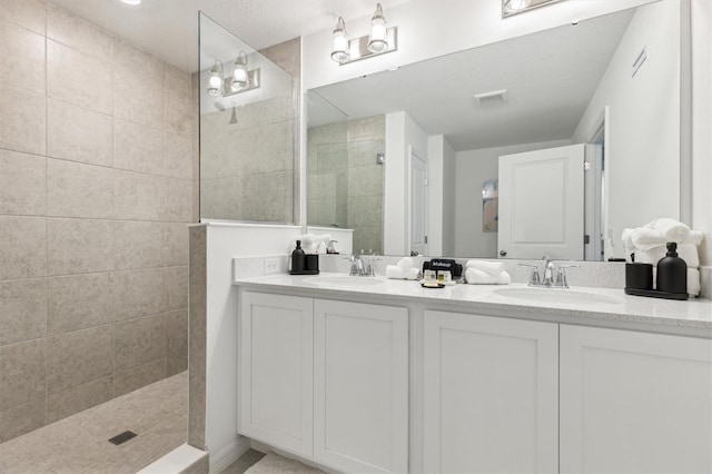 746 Longboat Dr, Davenport, FL 33896 - bathroom featuring double vanity and a walk in shower