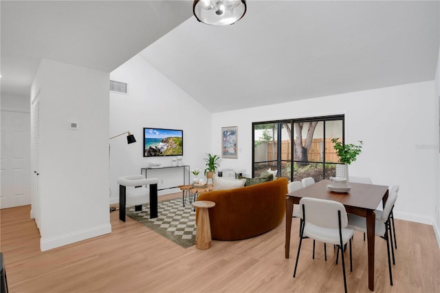 2541 Leeward Way, Winter Park, FL 32792 - living area with light wood finished floors, baseboards, and high vaulted ceiling