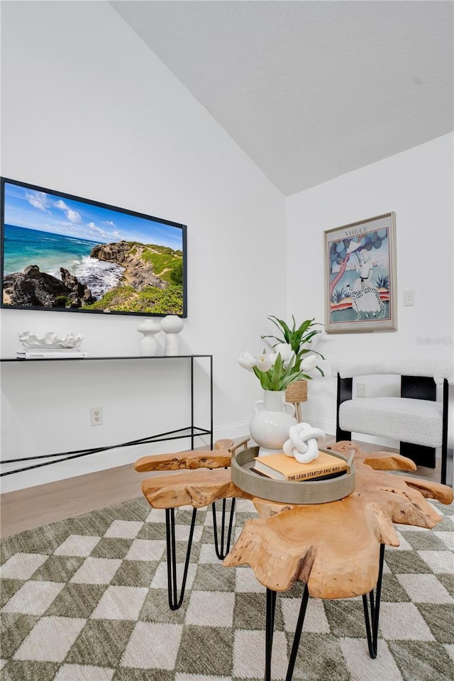 2541 Leeward Way, Winter Park, FL 32792 - sitting room featuring vaulted ceiling, wood finished floors, and baseboards