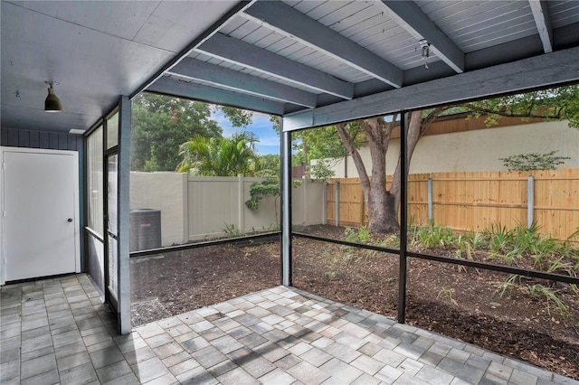 2541 Leeward Way, Winter Park, FL 32792 - unfurnished sunroom with beam ceiling