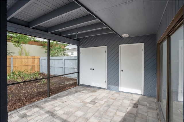 2541 Leeward Way, Winter Park, FL 32792 - unfurnished sunroom with beamed ceiling